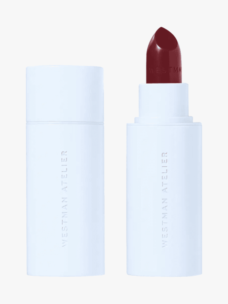 Westman Atelier HydroBalm in Glögg in branded component on a light gray background